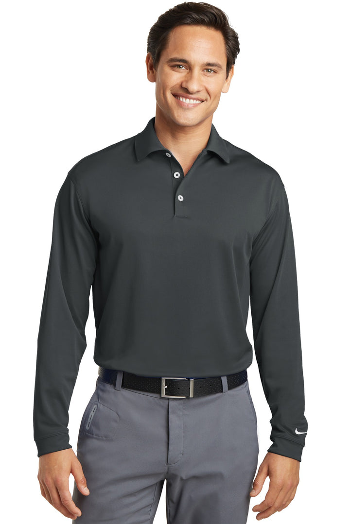 Front View of Anthracite Nike Tall Long Sleeve Dri-FIT Stretch Tech Polo. 604940