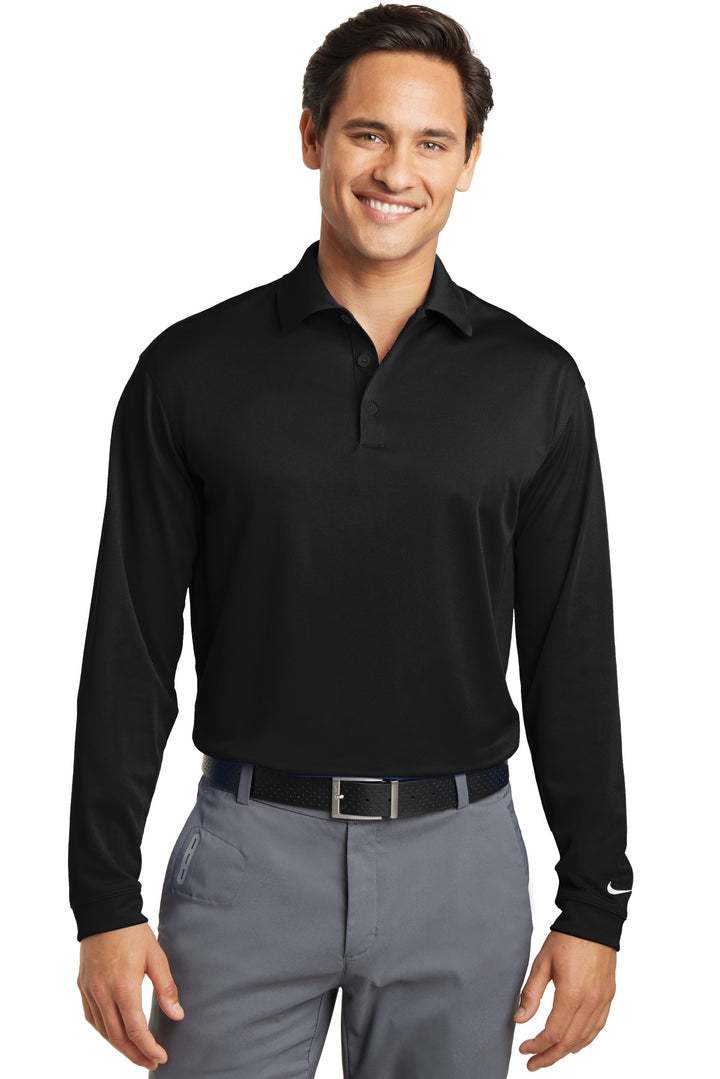Front View of Black Nike Tall Long Sleeve Dri-FIT Stretch Tech Polo. 604940