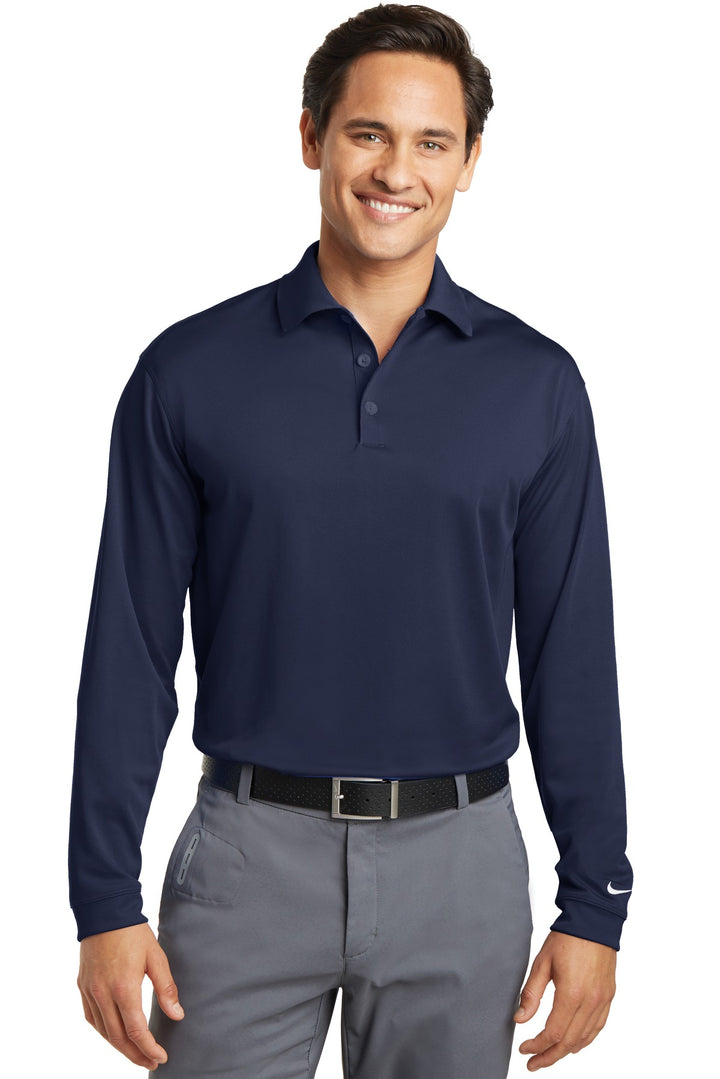 Front View of Midnight Navy Nike Tall Long Sleeve Dri-FIT Stretch Tech Polo. 604940